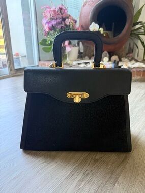 Valentino Garavani Classic Black Top-Handle Women's Handbag with Gold Hardware